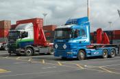 Scanias waiting for their load, Auckland
