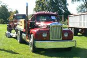 Mack Hauling A Ford