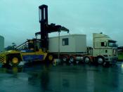 Unloading portacom with Container lifter!!